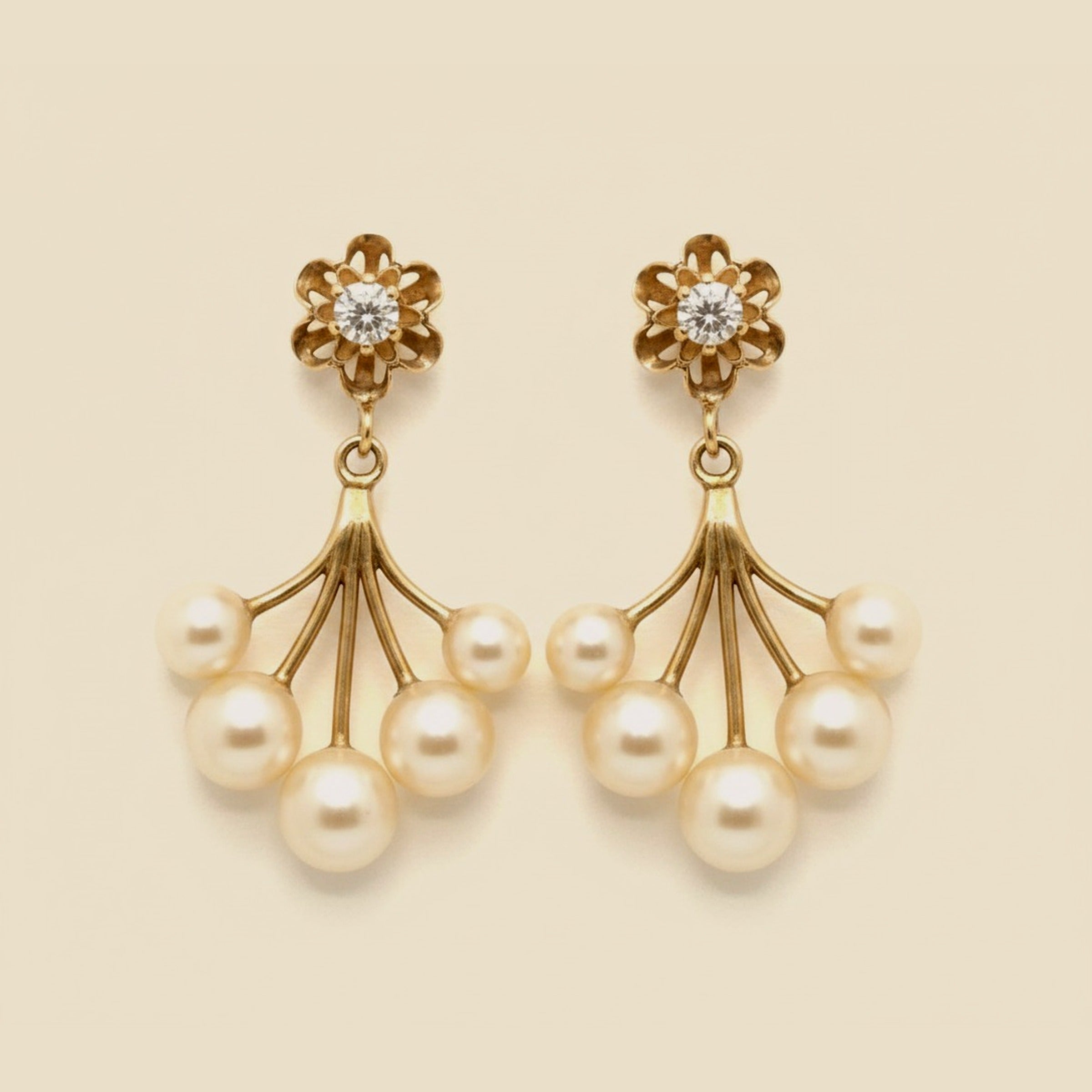 Yellow Gold Graduated Pearl Hanging Earring with a Diamond – Empire Diamond