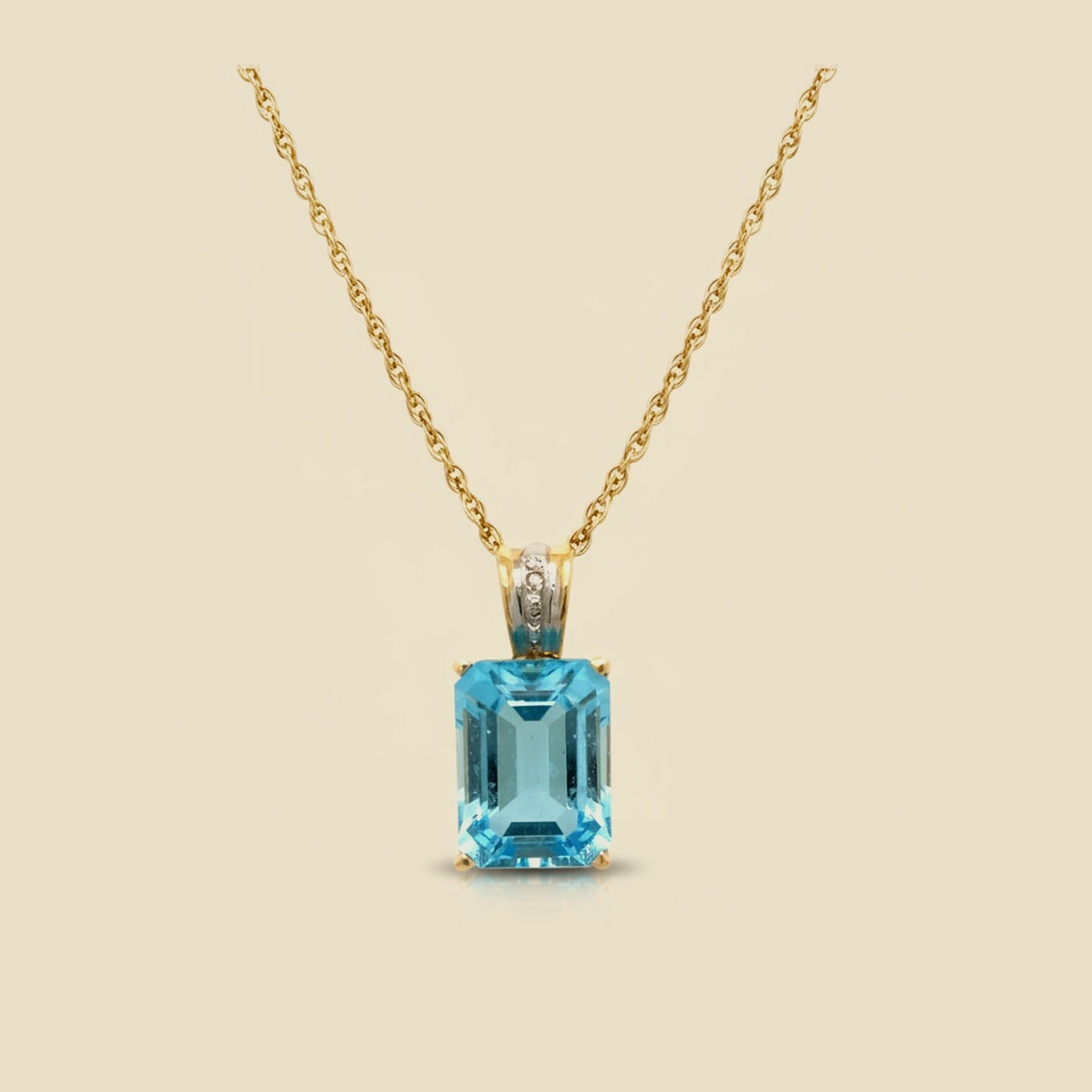 14k Yellow Gold Blue Topaz Pendant